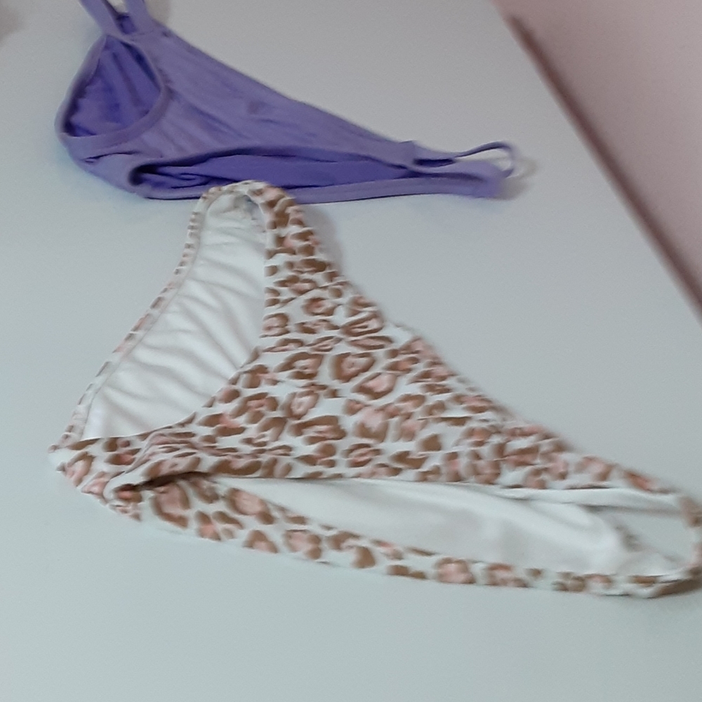 Two pair of bathing suit bottoms